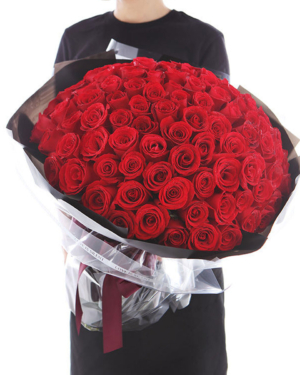 Large bouquet of 108 premium red roses wrapped in quality matte paper
