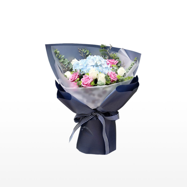 Medium bouquet of blue hydrangeas with purple and white rose accents wrapped in quality matte paper