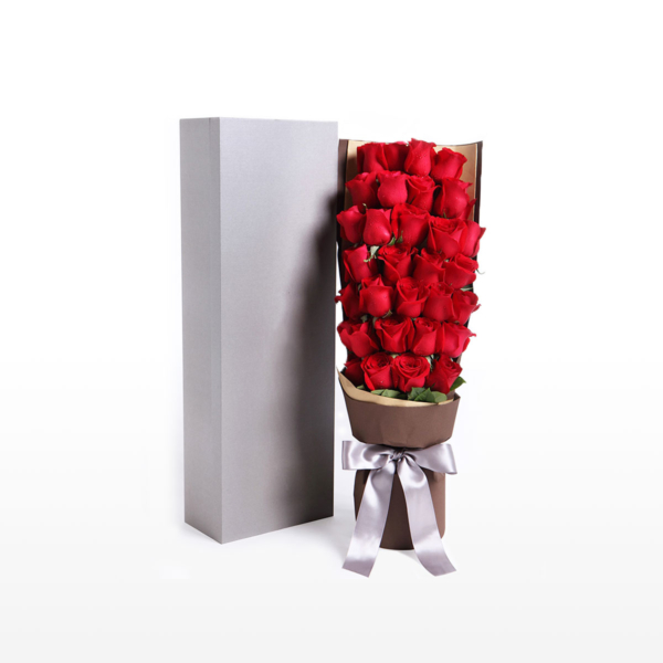 Medium bouquet of 33 premium red roses wrapped in quality matte paper and presented in an elegant gift box
