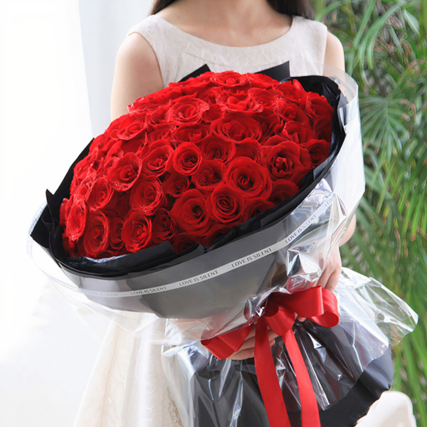 Large bouquet of 99 premium red roses wrapped in quality matte paper
