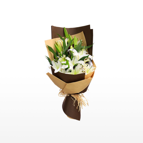 Medium bouquet of 6 white lilies and foliage accents wrapped in quality matte paper