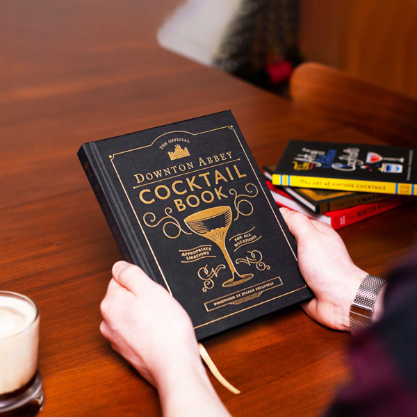 'Downton Abbey Cocktail Book'. Opulent mixology book gift for delivery to China.